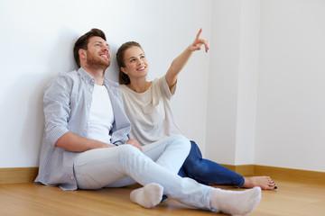 Sticker - happy couple at empty room of new home