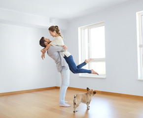 Wall Mural - happy couple at empty room of new home