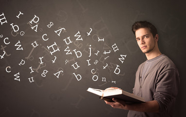 Sticker - Young man holding book with letters