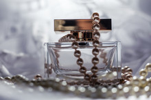 Perfume Bottle With White Pearls