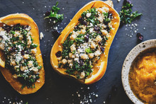 Stuffed Butternut Squash With Kale, Cranberries, Quinoa, And Chickpeas