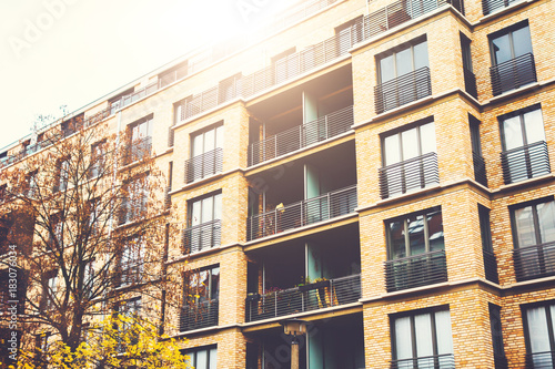 Very Modern Brick Apartment Building For Real Estate With Sunlight Very Modern Brick Apartment Building For Real Estate With Sunlight On The Top