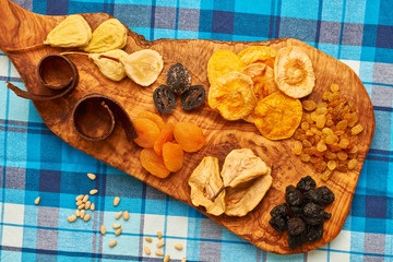 Canvas Print - Dried fruits on tablecloth