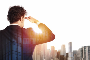 businessman looks far for the future