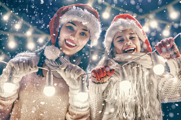 family playing on winter walk