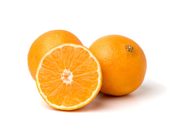 Wall Mural - Ripe tangerines and half on white background