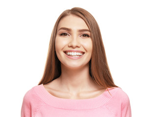 Portrait of young beautiful smiling woman on white background