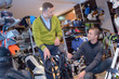 © auremar - seller and client in golf club store