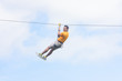 © auremar - man going down a zip line