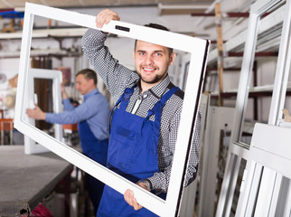 Wall Mural - Laughing workers with different PVC windows