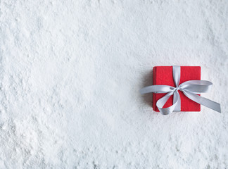 Wall Mural - christmas gift box,present on snow background.for christmas concepts or new year,celebration ideas.