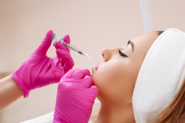 Procedure filler injection in beauty clinic.