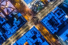 Aerial Drone View On City Intersection During Winter Night