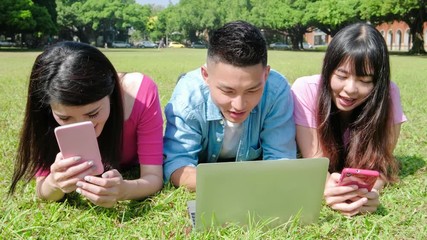 Wall Mural - student use phone and computer