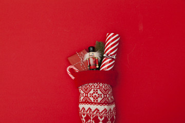 Wall Mural - Christmas stocking with cracker, toy and wrapped present