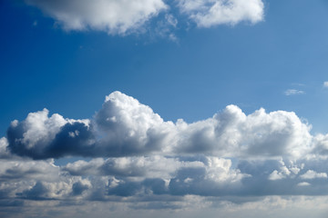 Sky and fluffy clouds