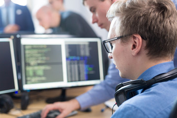 Wall Mural - startup business and entrepreneurship problem solving. young ai programmers and it software develope