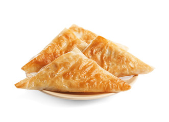 Sticker - Plate with delicious samosas on white background