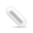 Realistic pill or tablet in capsule form. Caplet-shaped tablet isolated on the white background. Medicine and drugs.