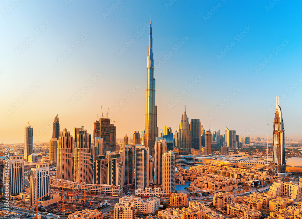 DUBAI ,UNITED ARAB EMIRATES-FEBRUARY 18, 2017: Beautiful Dubai downtown at the sunset,Dubai,United Arab Emirates - obrazy, fototapety, plakaty 