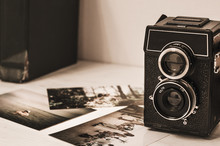 Vintage Photo Camera On Wooden Background With Instagram Retro Filter Effect