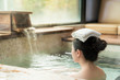 © PR Image Factory - rear view of young girl enjoy the hot springs