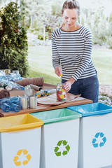 Housewife sorting colorful corks