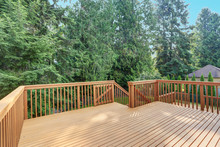 Empty Walkout Deck With Redwood Railings