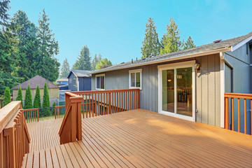 Empty walkout deck with redwood railings