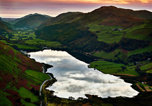 Sunset At Tal-y-llyn Lake South Of Cadair Idris Massif Looking Down The Dysynni Valley With The Peak Of Foel Ddu On The Right. In The Distance Are The Village Of Abergynolwyn And The Irish Sea.