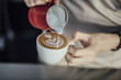 © LUMINA IMAGES - Close up of barista making cappuccino