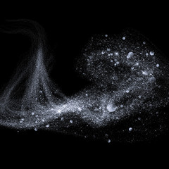 Wall Mural - Glittering silver smoke tail or heat haze wave wind snow texture. Silver light glitter trail or trace with lens flare bokeh blur effect of sparkling steam sparkling light isolated on black background