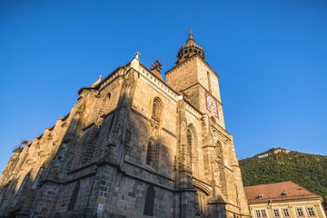 Wall Mural - Brasov, Romania. Black Church built in medieval times in Council Square in downtown of Brasov, Transylvania.