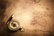 © bohbeh - Retro compass with vintage map