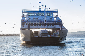 loaded ferry moves to another side