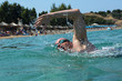 © Julia Mashkova - Tourist man in swimming sports glasses is floating in the Aegean Sea on the coast of Sithonia Peninsula