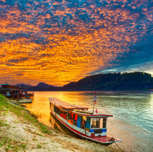 Touristic Boat At Sunset. Beautiful Landscape. Luang Prabang. Laos.