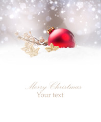 Christmas decoration in snow with free space. Celebration balls and other decoration. Christmas concept