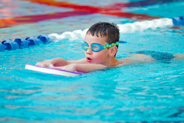 boy practice swimming