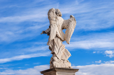 Wall Mural - Angel in the sky with clouds.  A 17th century baroque masterpiece at the top of Sant'Angelo Bridge in the center of Rome