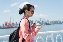 Asian Woman Using Her Phone In The Ferry 4K