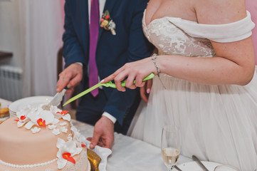 Wall Mural - The couple shared a wedding cake for serving guests 9279.