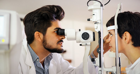 Poster - Girl woman in ophthalmology clinic for diopter detection