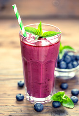 Wall Mural - Fresh blueberry smoothie in the glass 