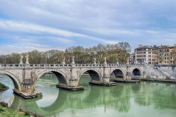 Wall Mural - cityscape of Sant'Angelo bridge above green river in Rome