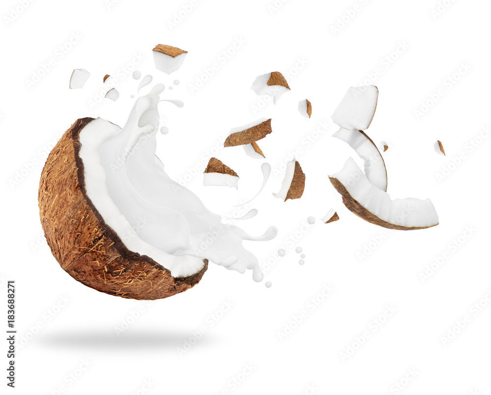 Broken coconut with milk splash, isolated on white background - obrazy, fototapety, plakaty 