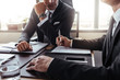 © Jacob Lund - Two businessmen in a discussion at office