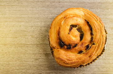 Raisin pie  on wood background