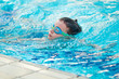 © Michael - young champion swimming in pool.
