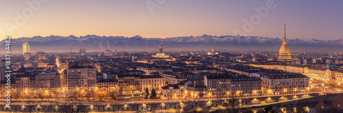 Fotomural Turin, Italy: cityscape at sunrise with details of the Mole Antonelliana of Tori